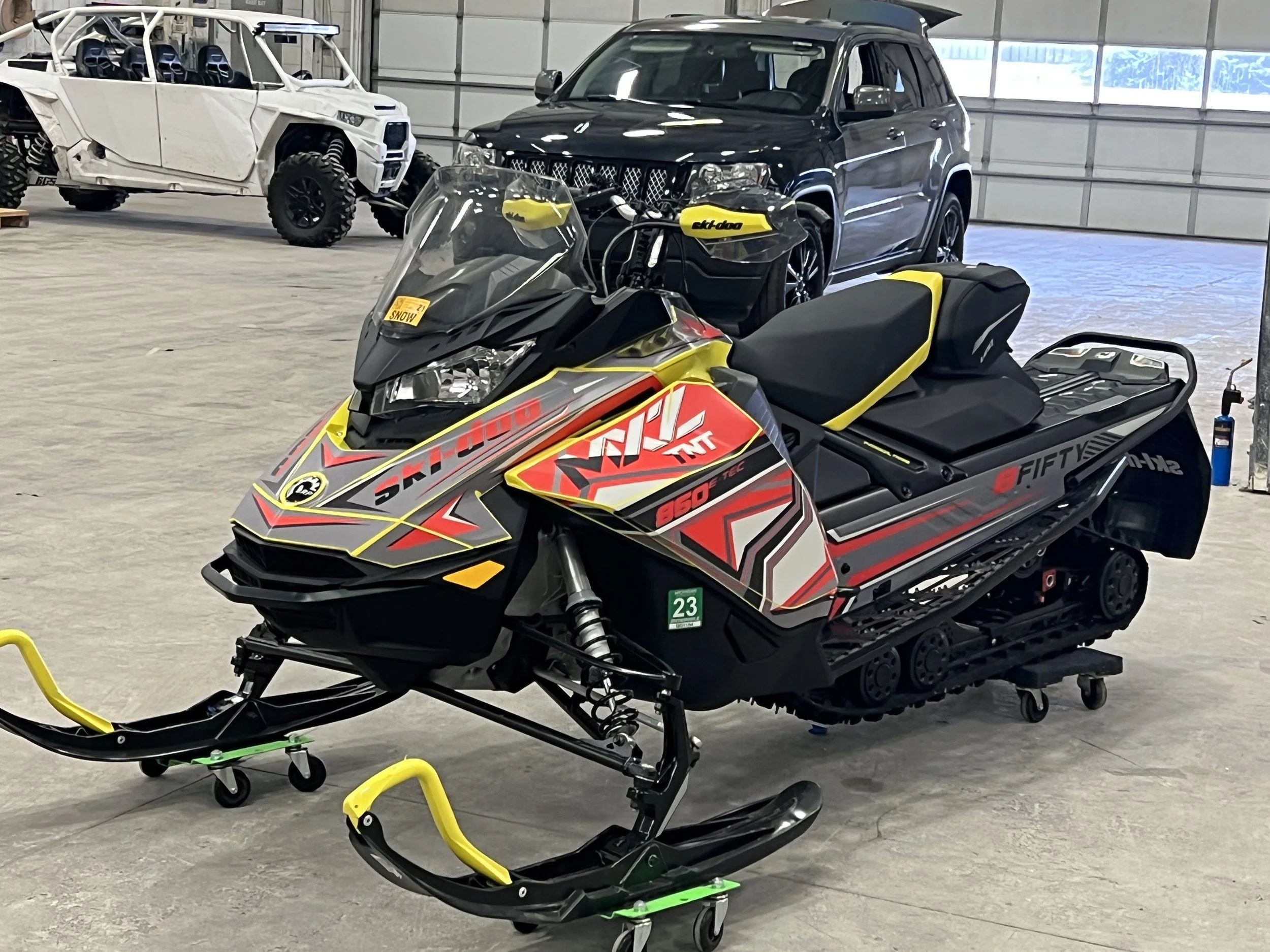 Red and Yellow Snowmobile.JPG