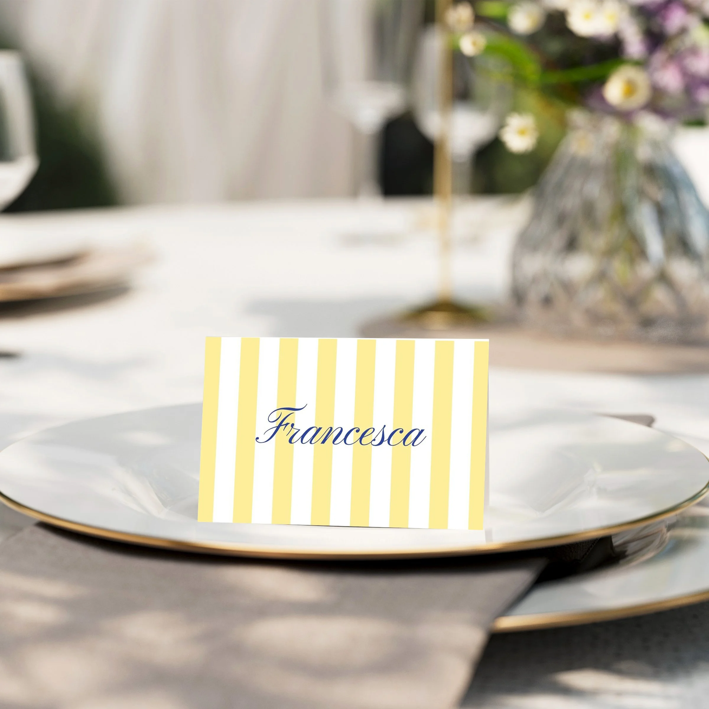 DIY place card canvas template shown on a wedding table