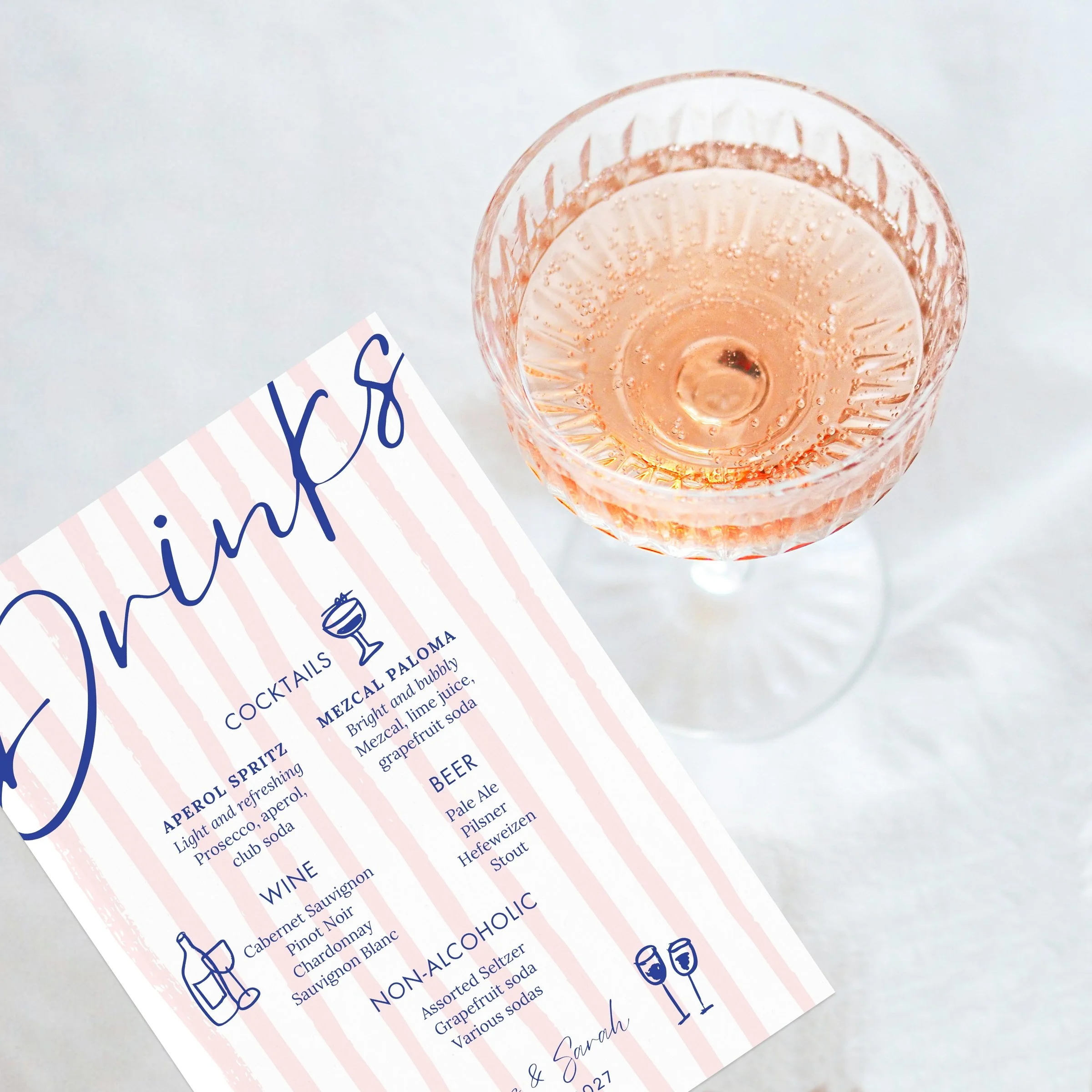 Champagne coupe with drinks menu copy.jpg