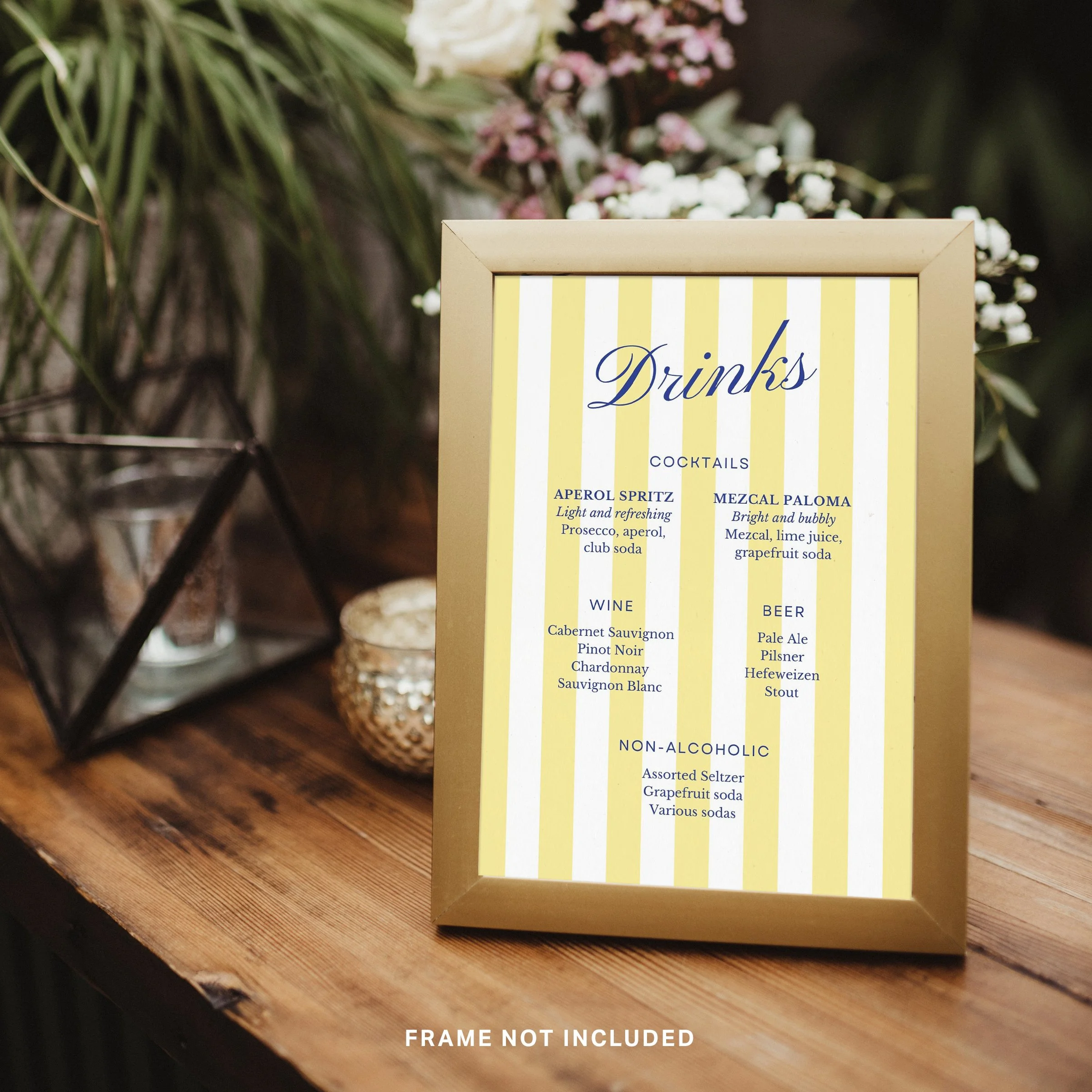 Image of a wedding bar sign created from a Canva template on a wood bar top