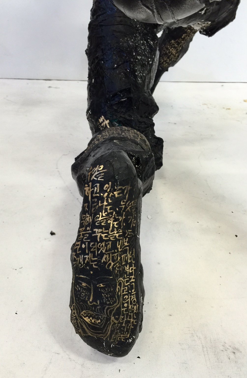 Detail of Man Carrying His Ego 1, 2015