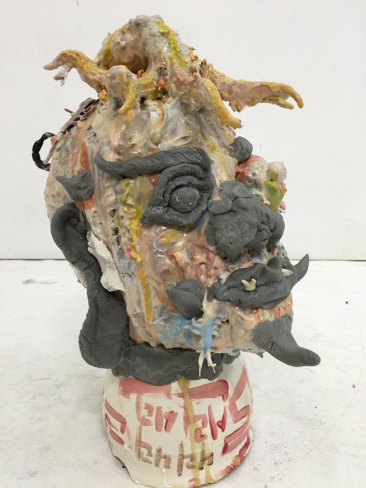 Man Carrying His Ego 2, 2015
 Foam, plaster, epoxy clay, acrylic, spray paint, mixed media
 18 × 9 × 9 in
