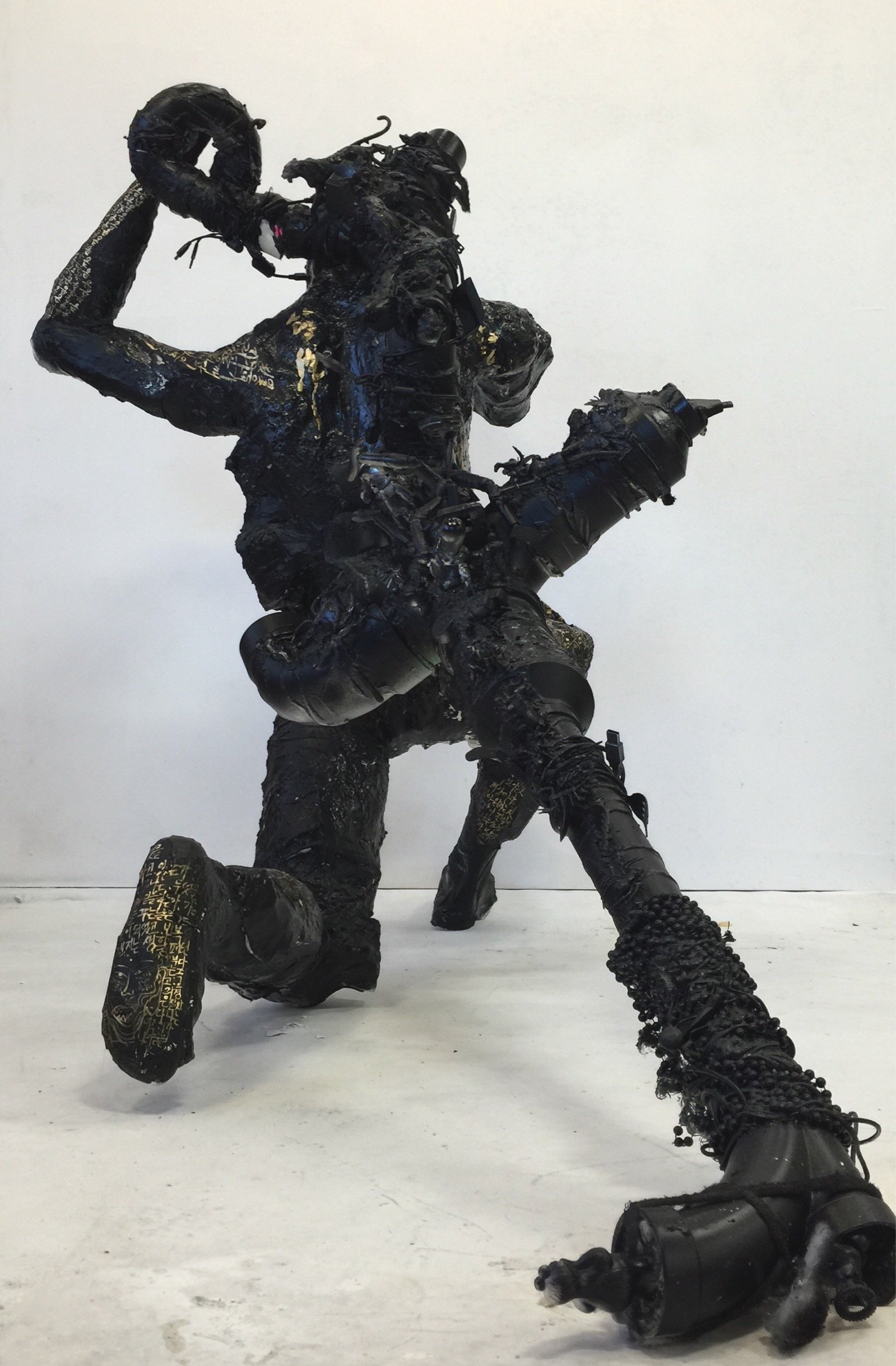 Man Carrying His Ego 1, 2015
 Foam, plaster, epoxy clay, acrylic, spray paint, mixed media
 62 × 28 × 120 in
