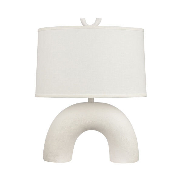 Earthenware table lamp from @jaipurliving brings sculptural symmetry and organic softness to the space.