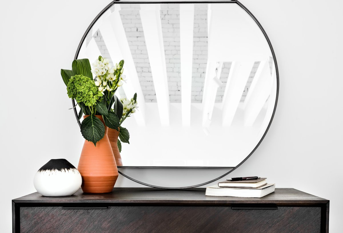 Fülhaus Channels a Luxury Penthouse's Architectural Charm Through Modern Design — interior styling detail 6 for luxury short-term rental owners