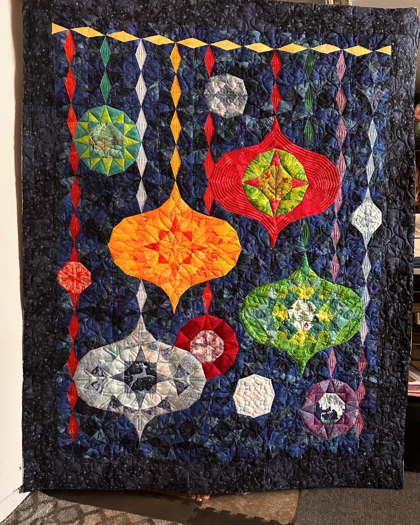 We were a little hesitant at first but then we got in to quilting the quilt and we loved it. Better than us loving it, our customer was very happy with how we quilted it. Yes, we do custom quilting,  but more importantly we consult with each quilter 