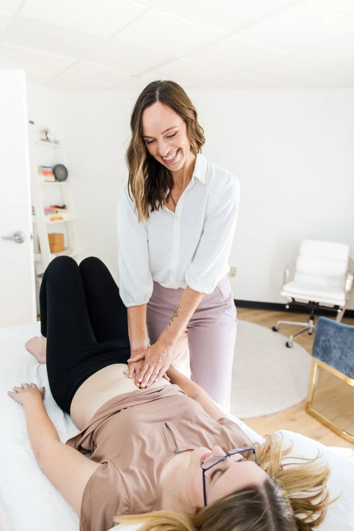 Dr. Jennifer Gelfand performing visceral mobilization treatment during pelvic floor physical therapy session at Root To Rise Physical Therapy and Pelvic Health in Scarborough Maine