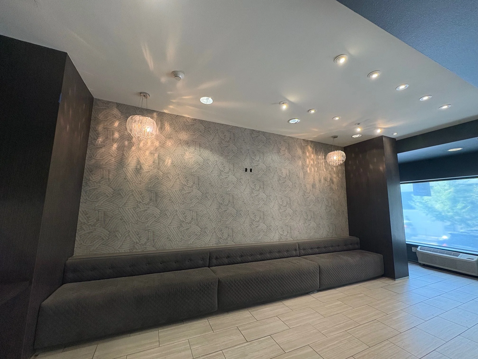 Interior painting and wallpaper installation at high‑end apartment building in downtown Portland, Oregon.