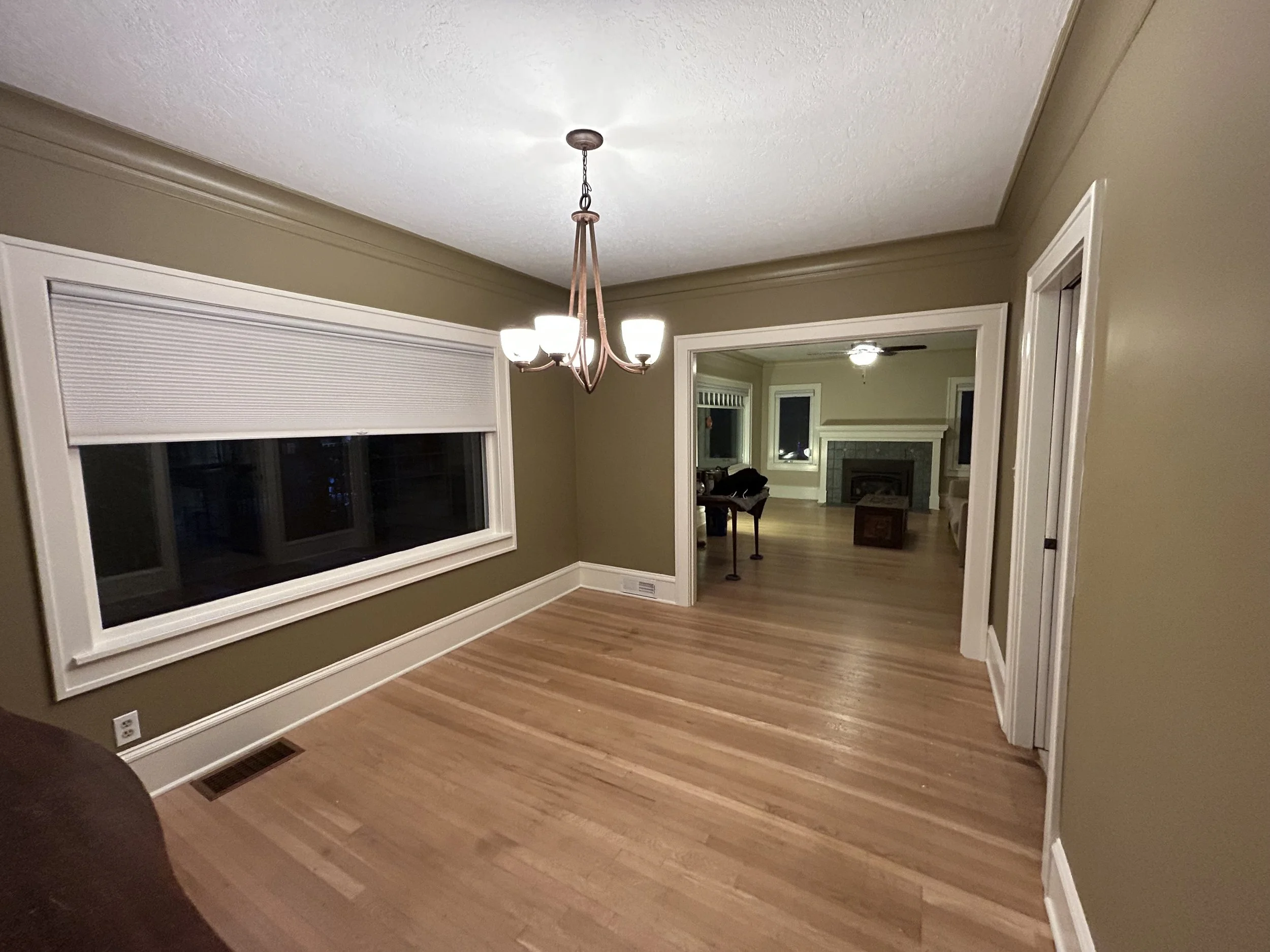 Interior painting in East Portland featuring walls, ceilings, crown molding, and baseboards finished with Sherwin‑Williams Duration paint.