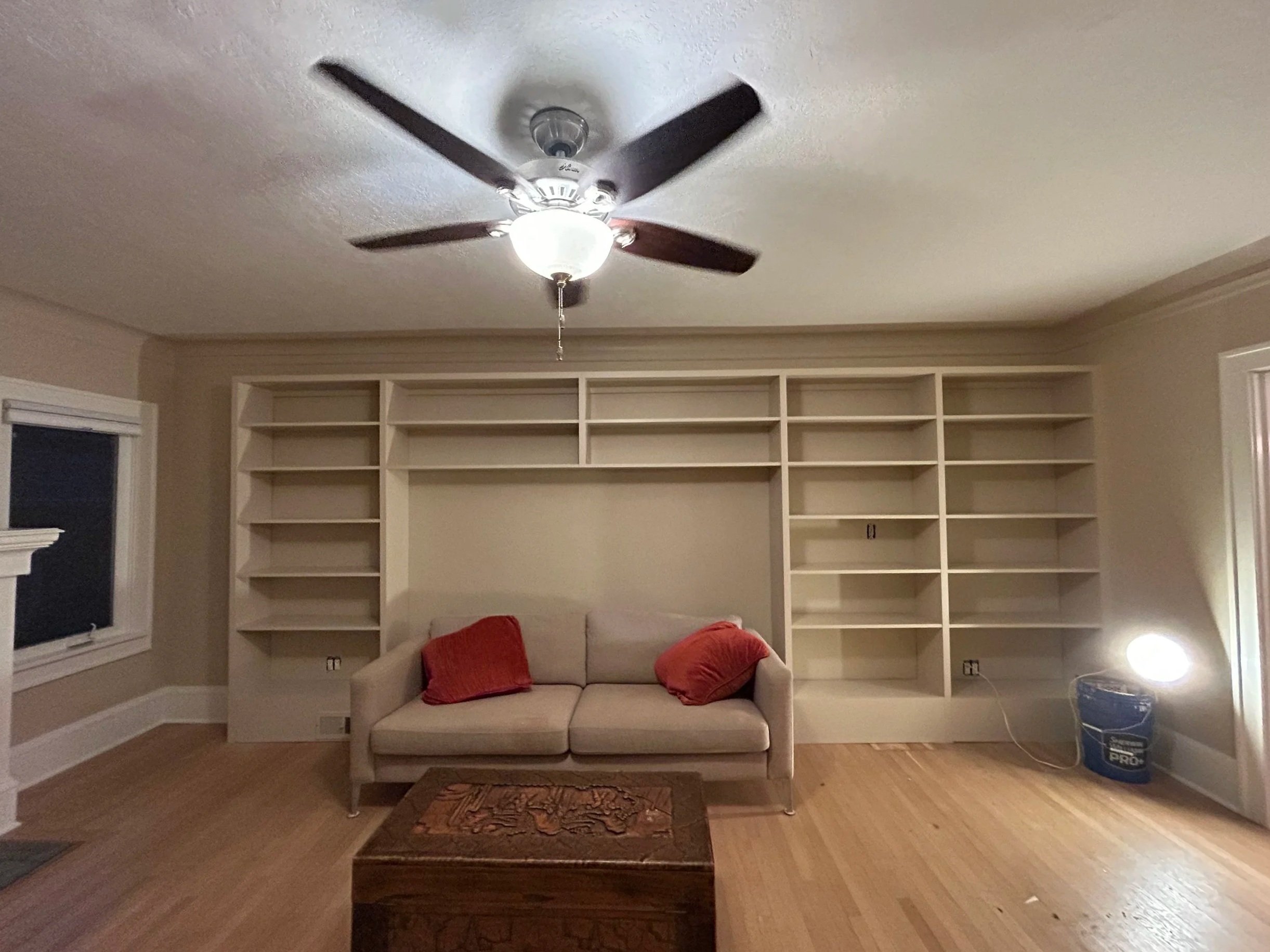 Interior painting project in East Portland showcasing freshly painted built‑in bookshelves completed by Certified Painting & Contracting.