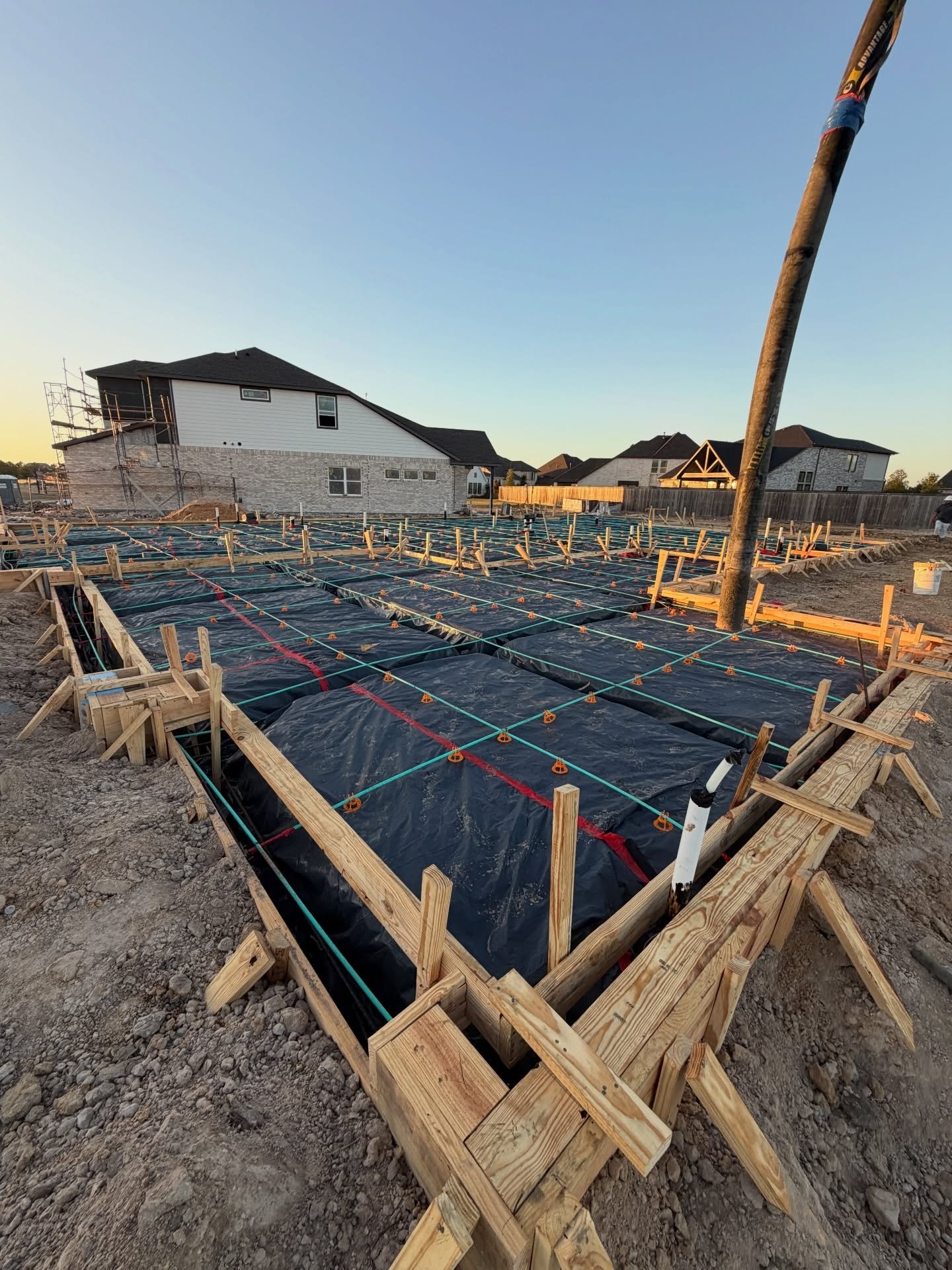 Prep work matters more than people think.

Before any concrete is poured, the groundwork has to be done right. Proper grading, forms, and reinforcement are what ensure a strong, level foundation that holds up long after the job is finished. 

Cutting