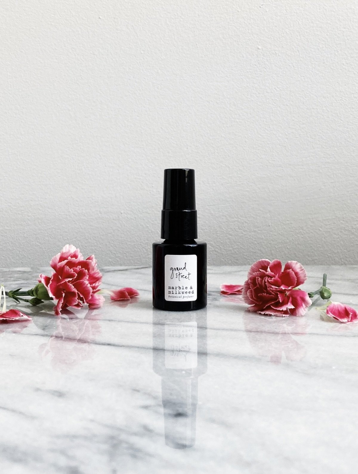 my mind turns to the fragrance of carnations at this moment of the year, as the neighborhood around us begins to prepare for Lunar New Year celebrations.

{ our grand street botanical perfume }

an heirloom flower, 
a perfume extrait.

an evolution, 
