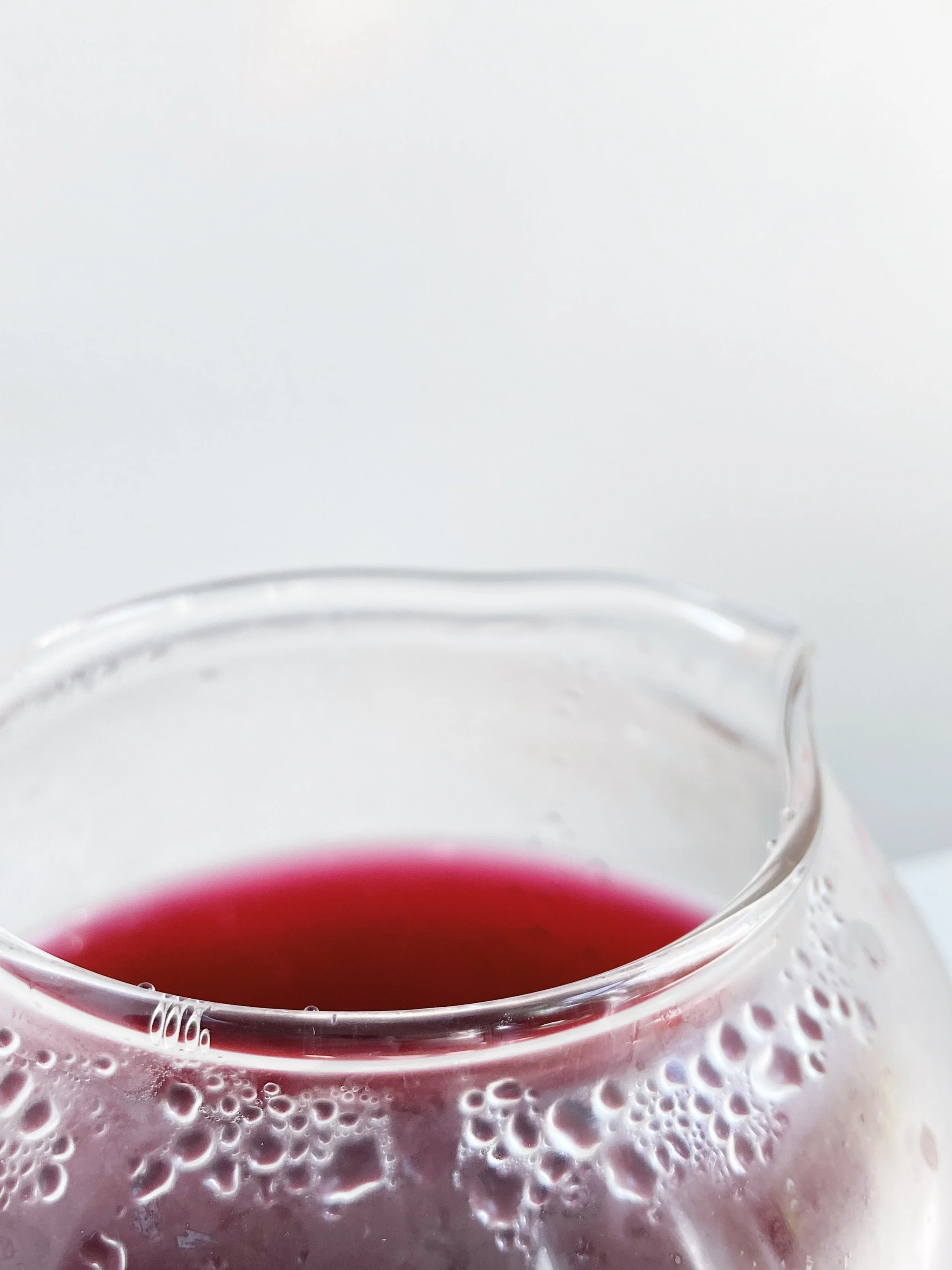 marble & milkweed | hibiscus rose tisane in glass.jpg