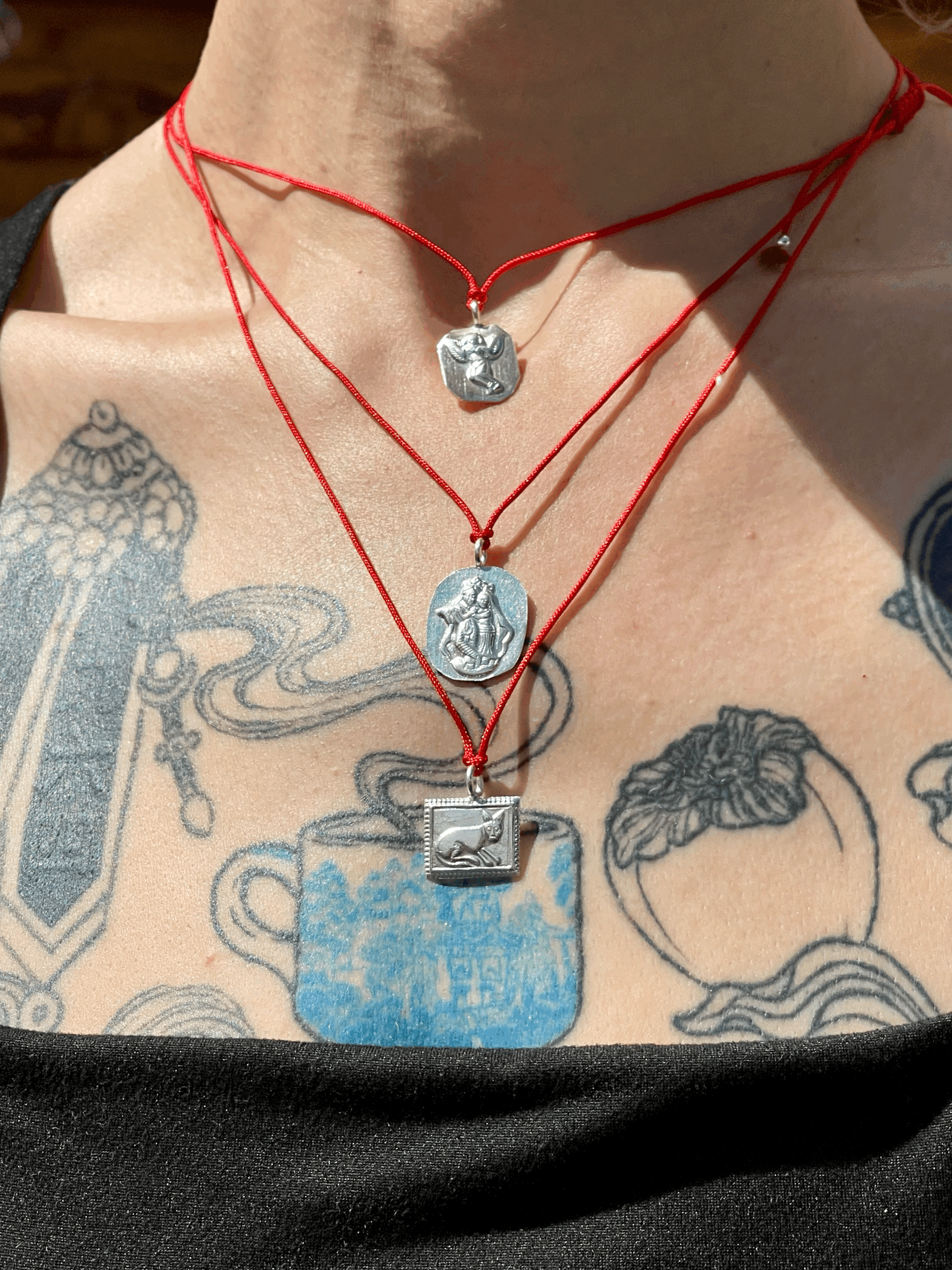 Small Stamped Sterling Silver Talismans on Adjustable Red Cord
