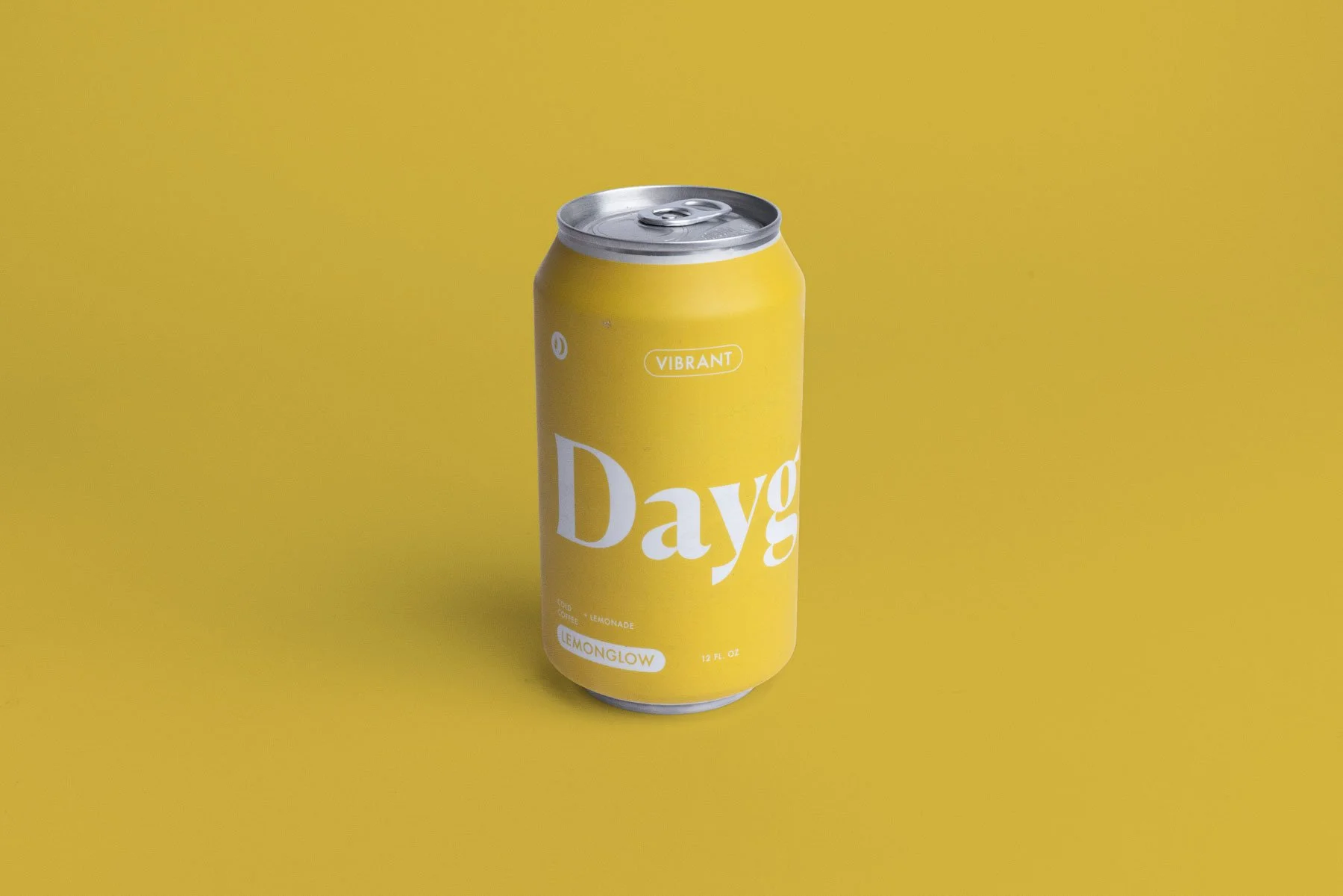 A yellow soda can with white text that says 'Days' and smaller text that reads 'VIBRANT' and 'LEMONGLOW' on a yellow background.