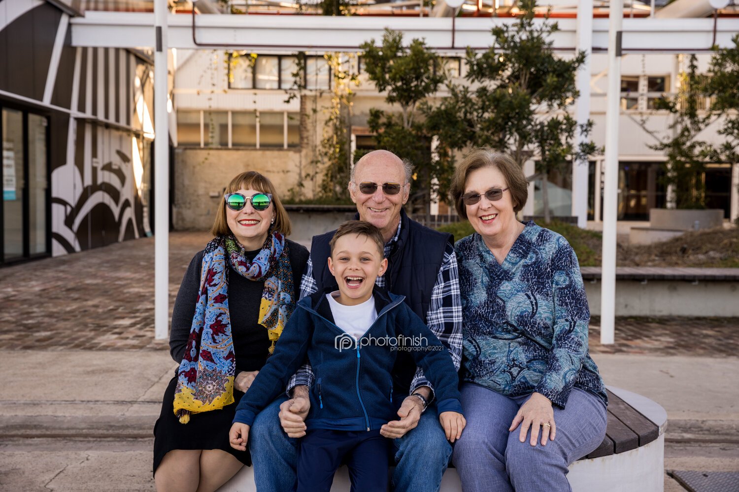 Boy with grandparents at family photo session at Sub Platypus Base in North Sydney