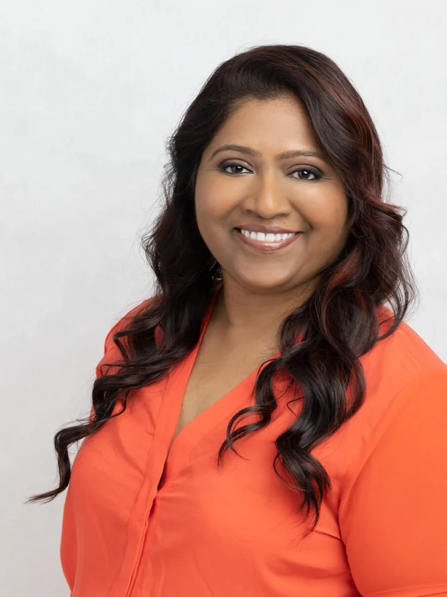 Smiling and confident professional woman during a corporate headshots photo session in Lane Cove studio in Sydney