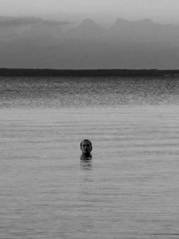 Portrait of Tomi Tate in a lake