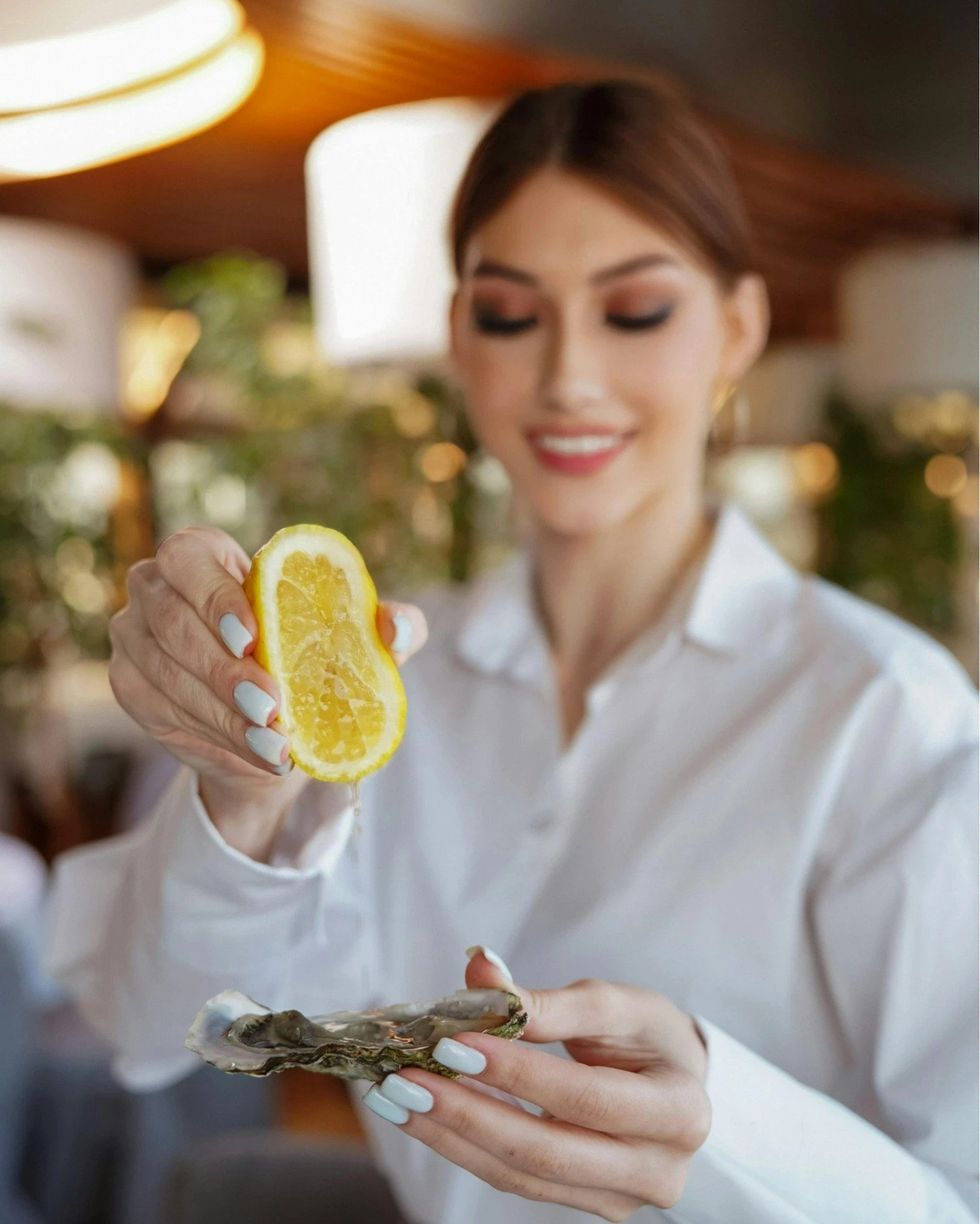 Enhance your oyster experience with a squeeze of fresh lemon&mdash;a timeless classic! 🍋🦪

#OysterAndLemon #ClassicCombo