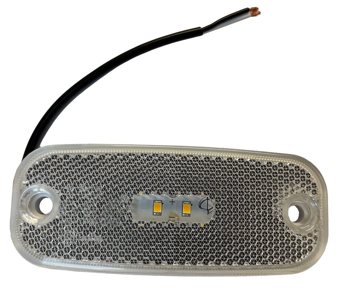 Rectangular LED trailer light with a textured cover and two mounting holes, connected to a black electrical wire.