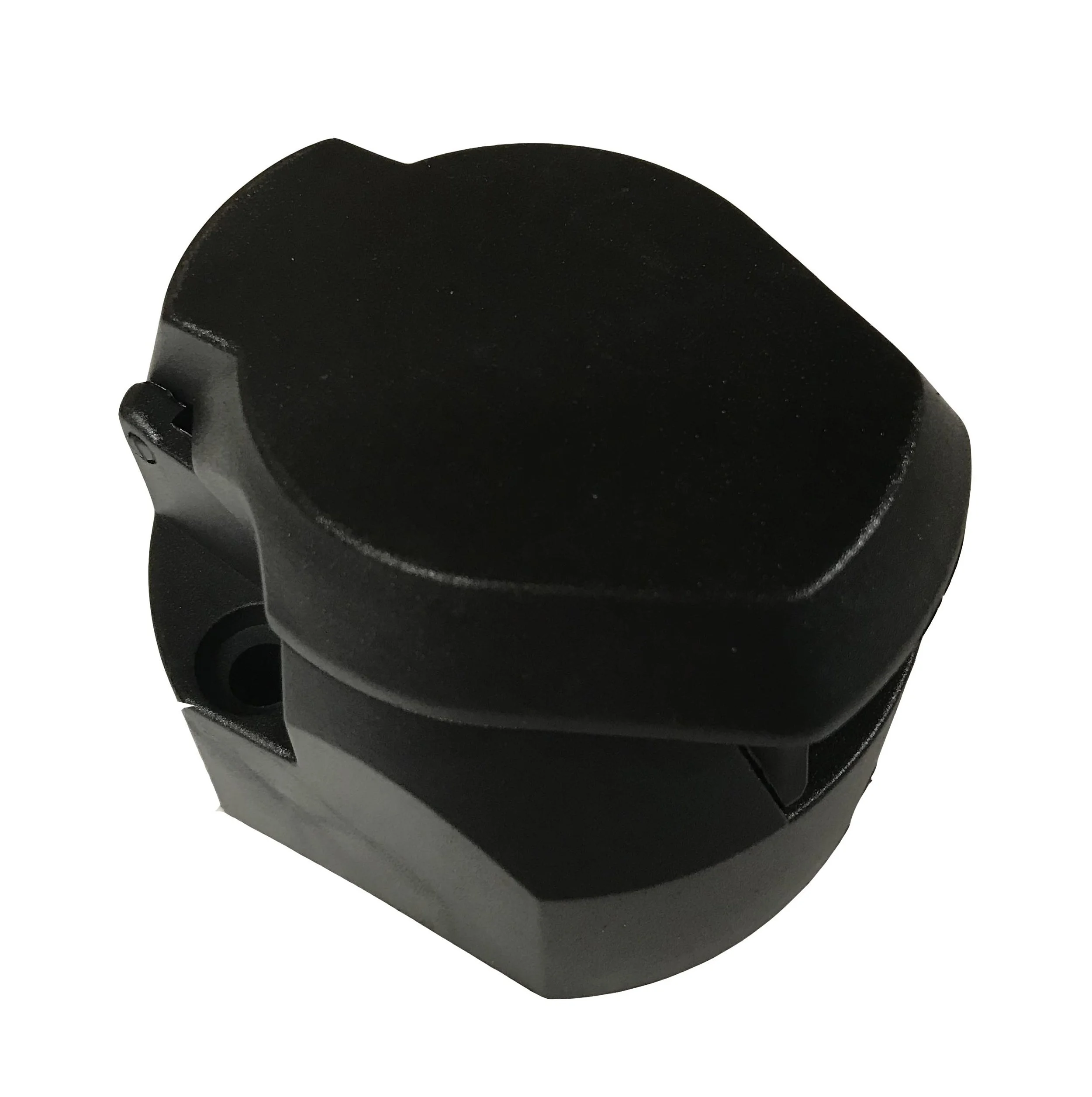 Black rubber or plastic plug for a trailer with a curved top and rounded edges against a white background.
