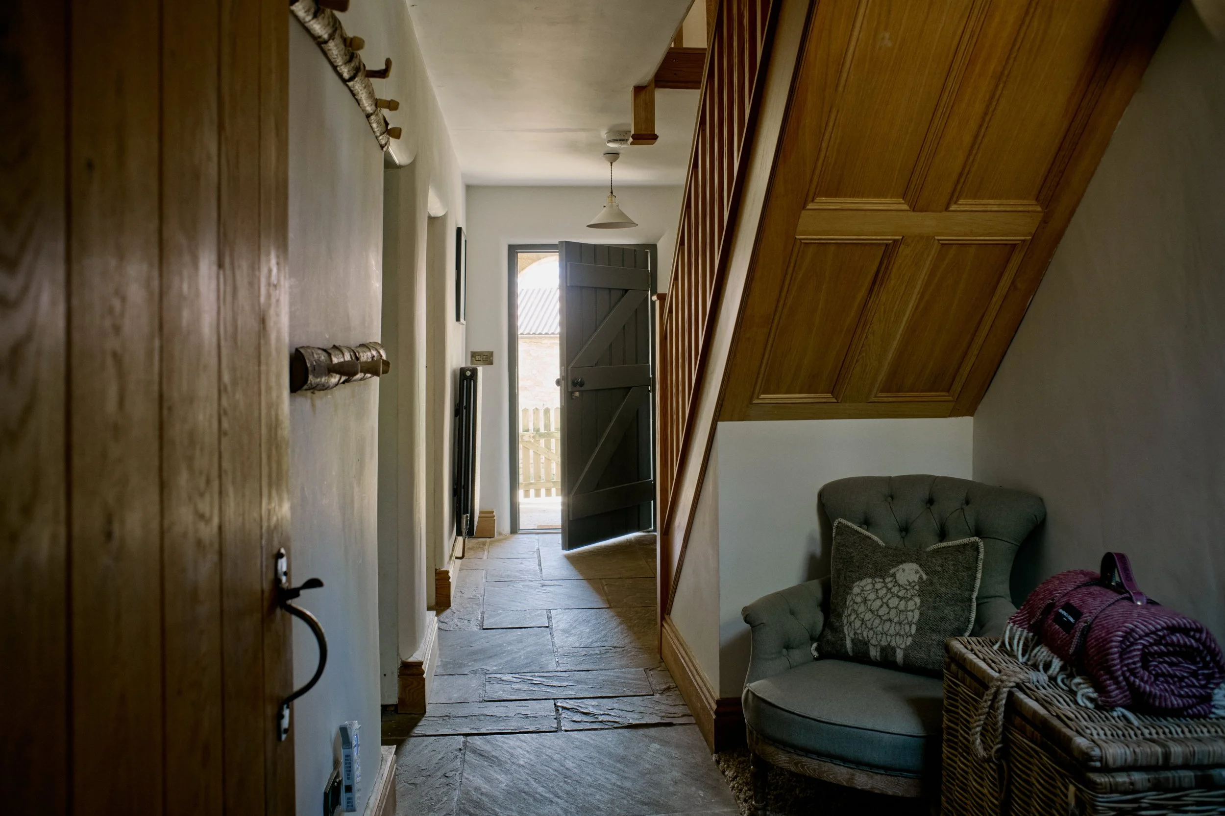 Farmhouse hallway leading to front door