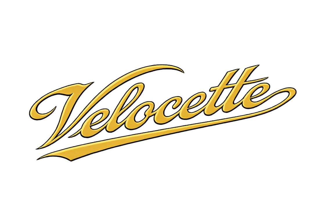 velocette logo in yellow gold and black