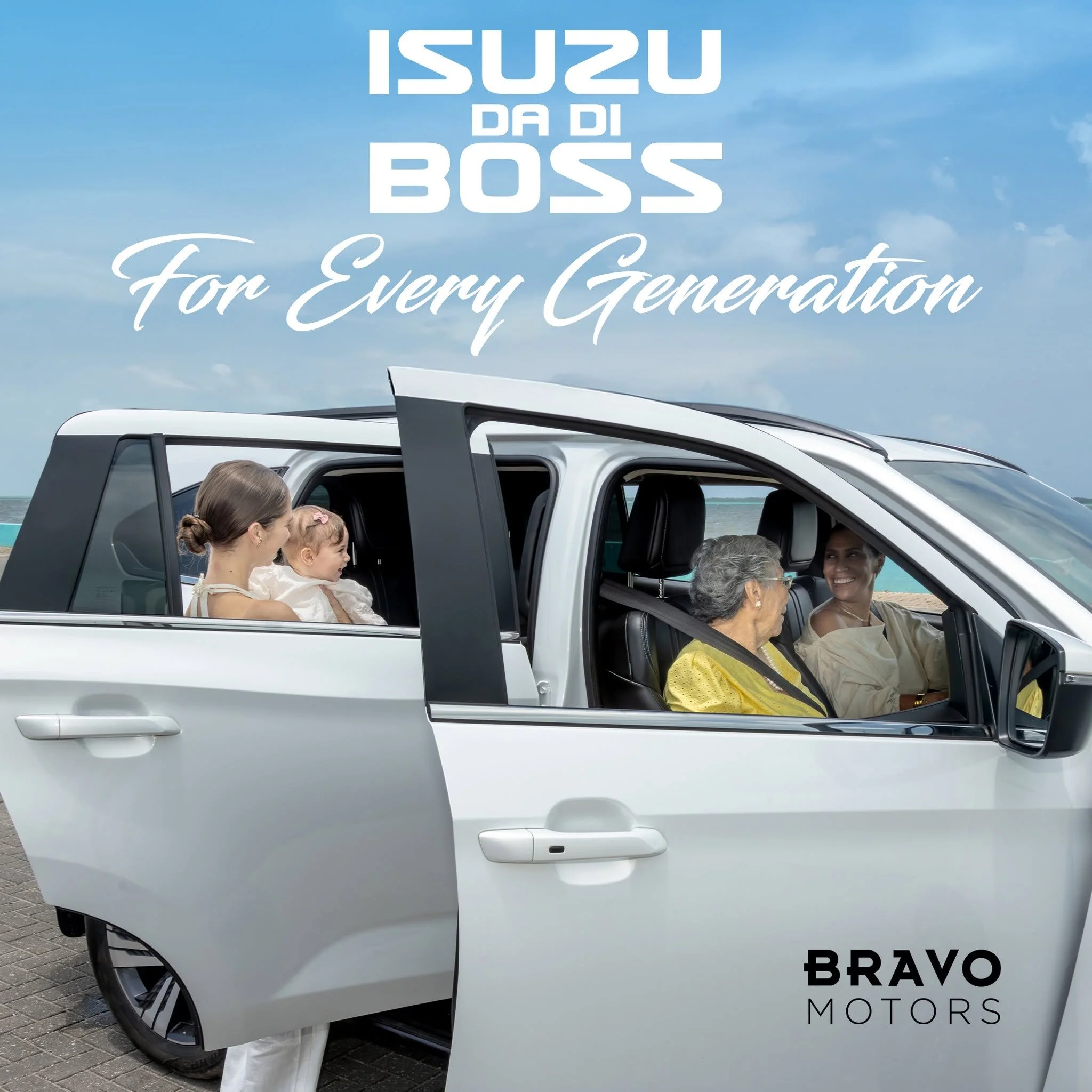 Multiple generations gathered around a vehicle
