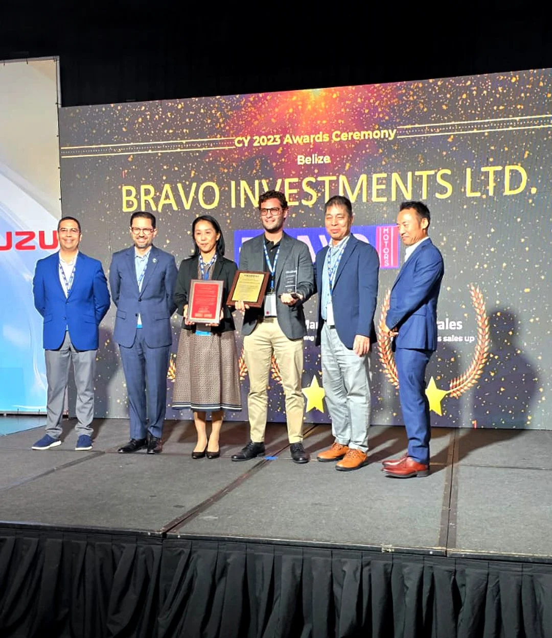 Bravo Motors receiving sales achievement recognition