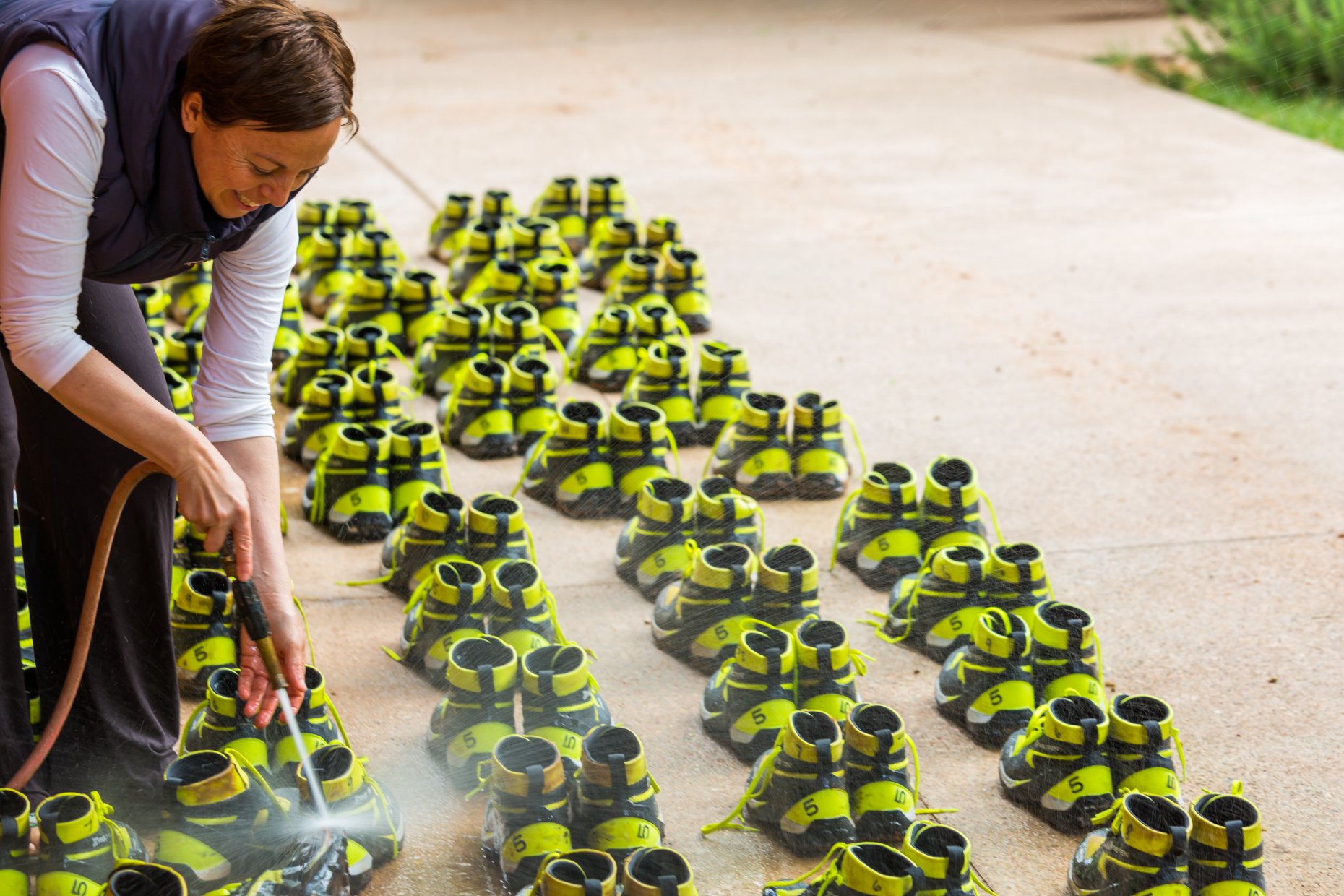 Catrin sprays out rental shoes used to hike the Zion Narrows. (Copy)