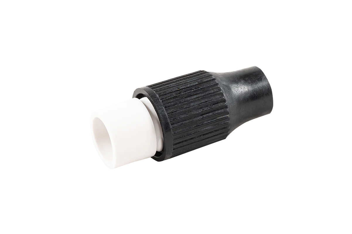 Wire connector with black ribbed plastic exterior and white interior insert.
