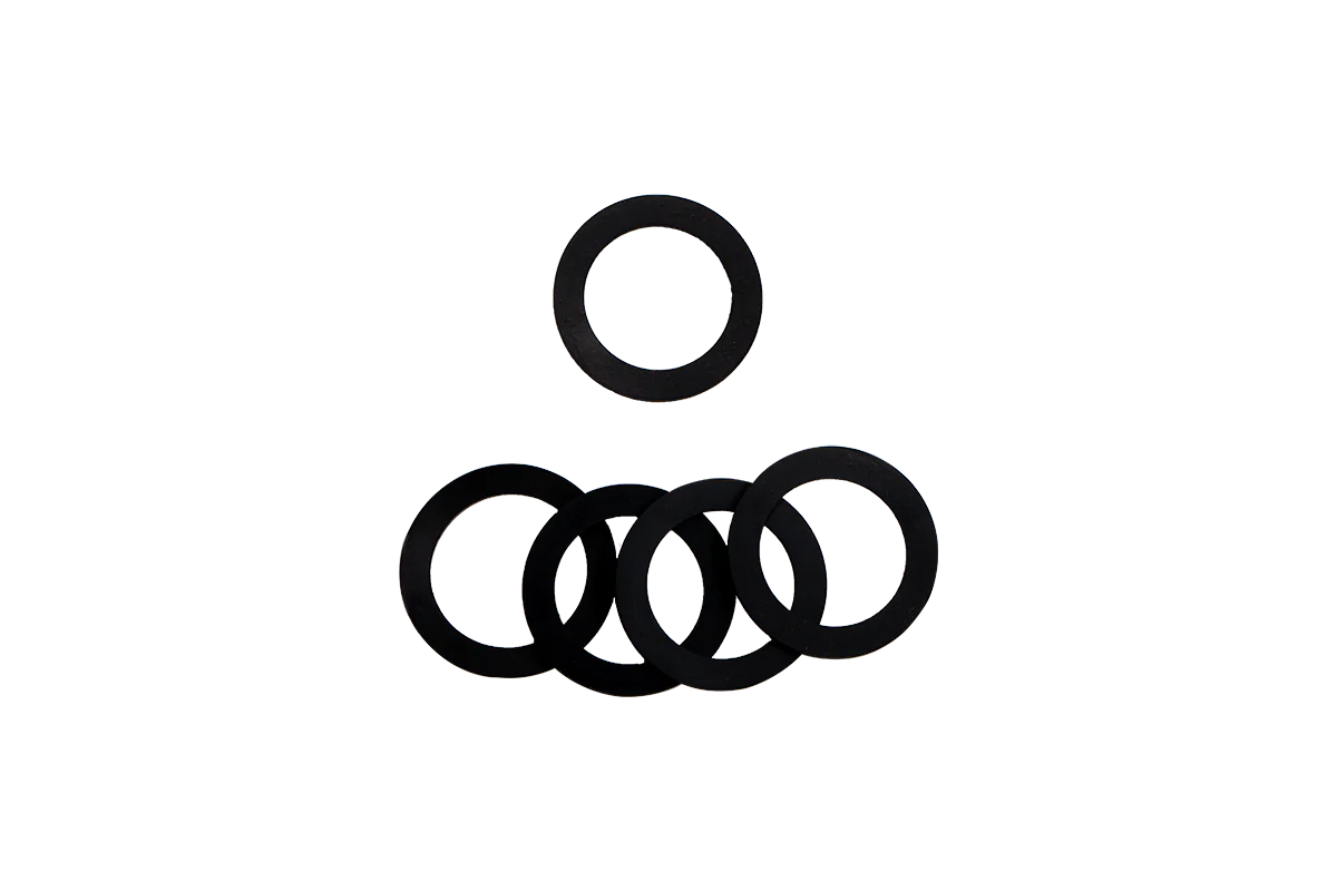 Seven black rubber O-rings on a white background.
