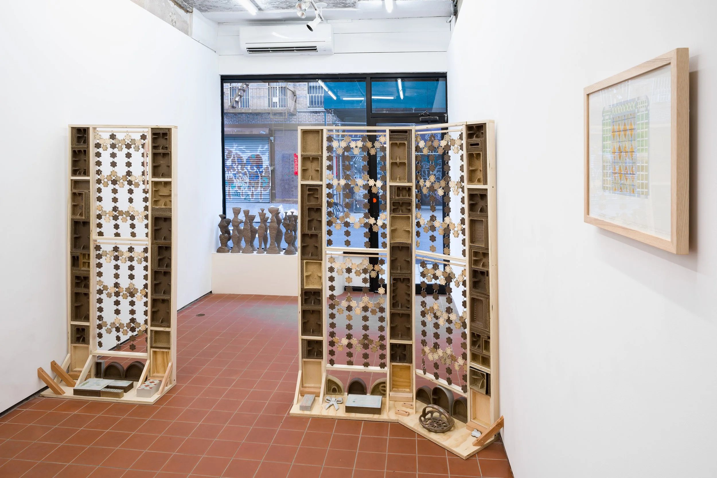 Interior Wall , 2023
 
Stoneware, wood, metal binder
rings, cardboard, silk ribbon
 
69 x 108 x 24 in.