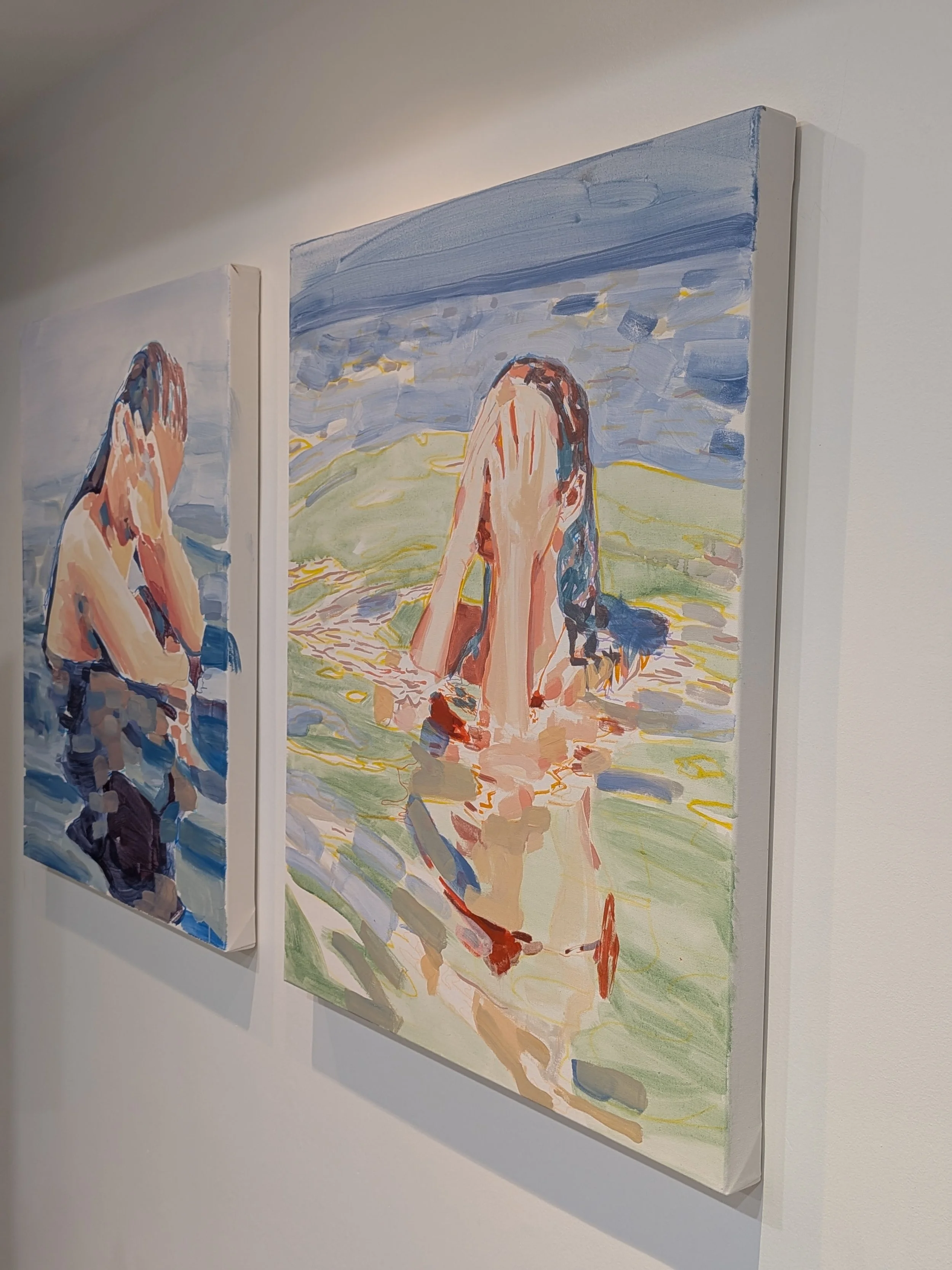Detail of a hand-painted swimmer: hands pressed over a face and wet dark hair