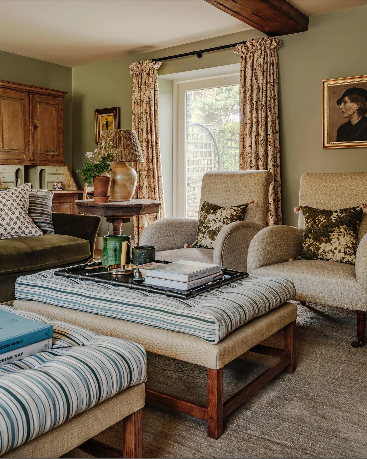 The main sitting room in our Cotswolds barn project, where we used a warm palette to cosy up what was previously a white-washed blank canvas done up by developers. Starting with @farrowandball Pigeon on the walls, a favourite colour of our client's, 