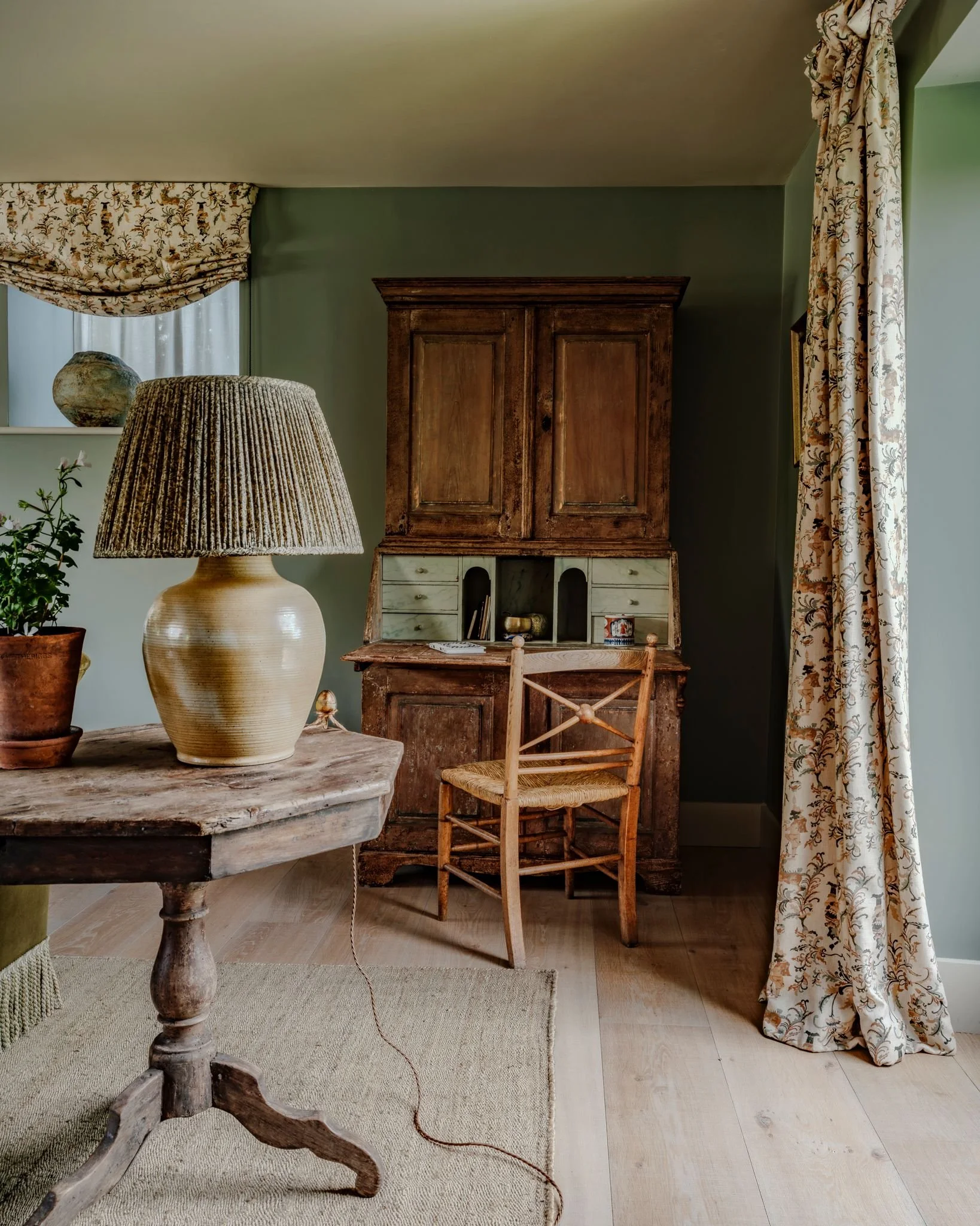 Another detail of the sitting room at our Cotswold barn project. We love the moody, yet calm feel of this room with the use of rich and warm colours. The ceramic lamp was one of last finds and picks up so beautifully on the golden tones in the curtai