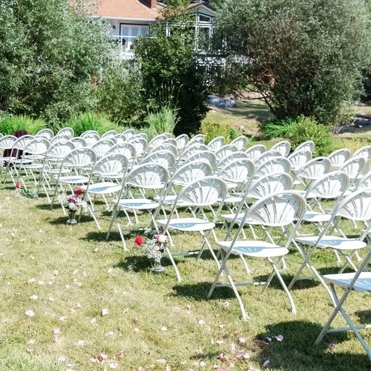 White plastic folding wedding chairs for rent for outdoor and indoor weddings around the Okanagan Valley