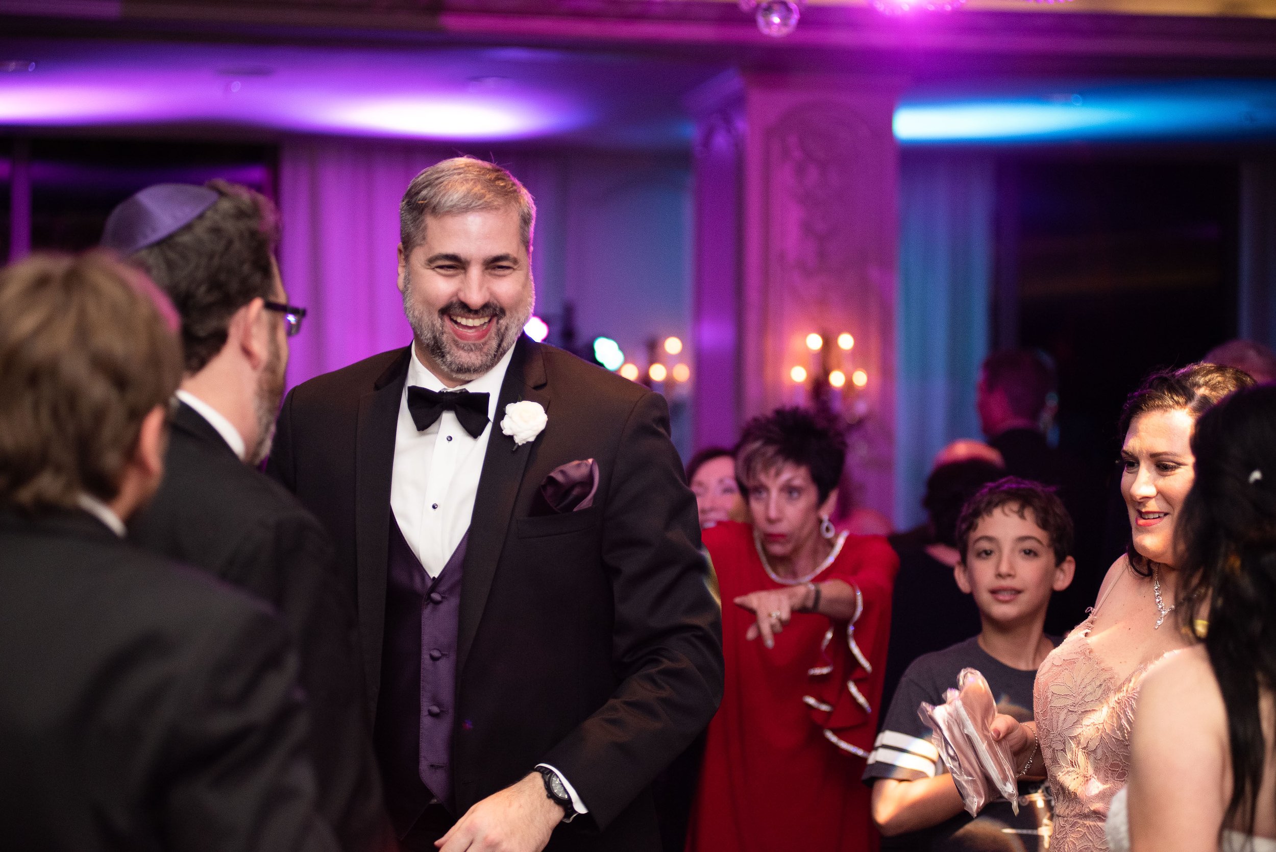 People from diverse backgrounds coming together, enjoying each other's company and building connections at events, captured in candid and genuine moments by a skilled event photographer in Houston, reflecting the spirit of community and inclusivity.