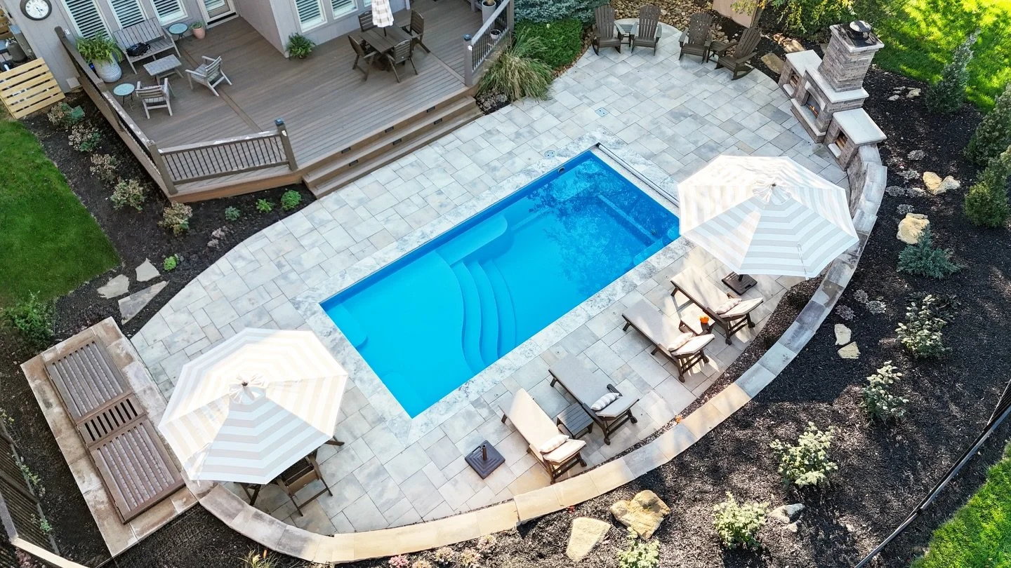 A Thursday Pools Aspen 12x25 in the California color, designed to make the most of the space while still feeling open and usable.

This elevated backyard came together with intention, from the Belgard Scandina gray pavers and silver tumbled coping th