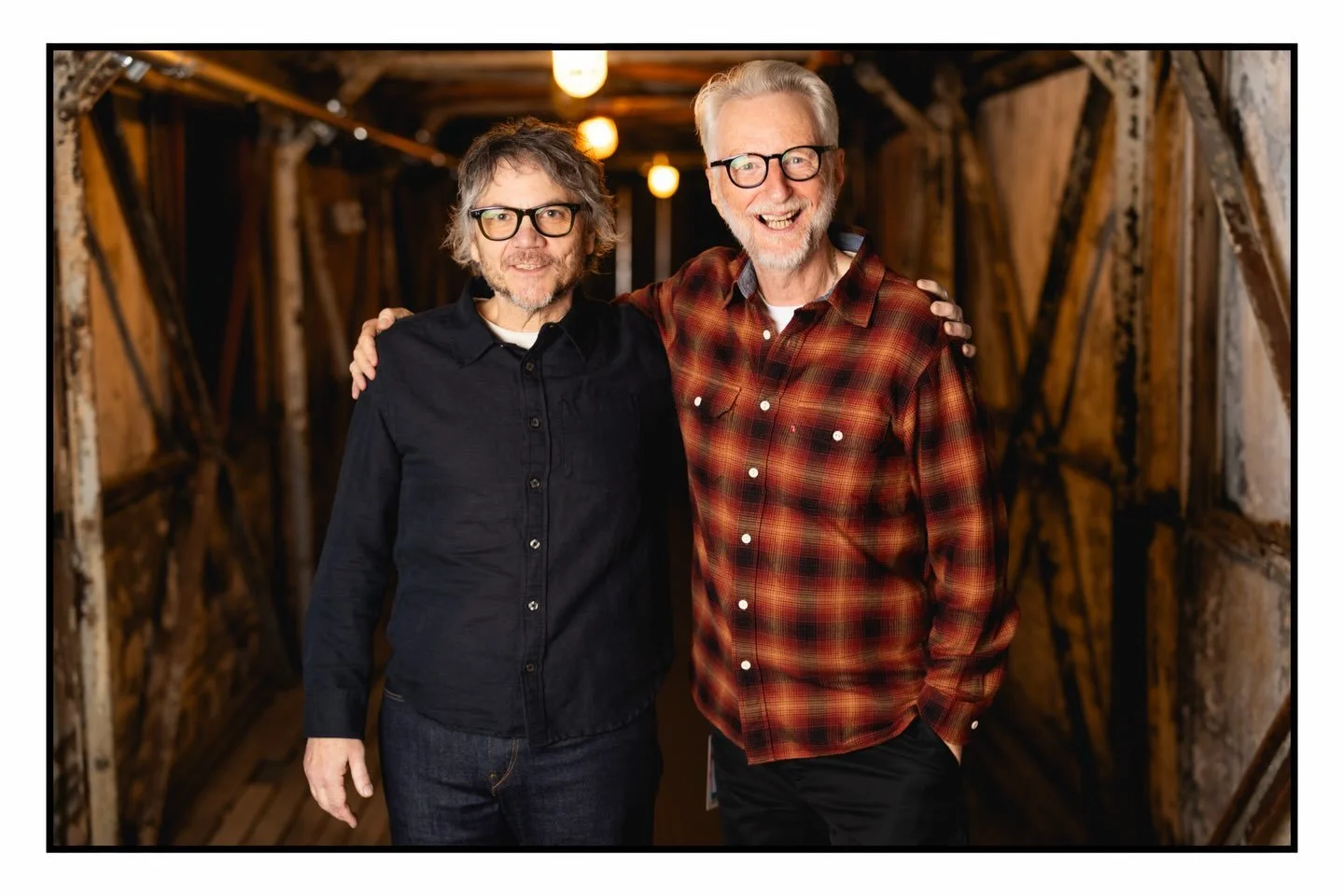 Jeff Tweedy &amp; Billy Bragg, moments before going on stage to perform the first Mermaid Avenue set since its release in 1998. 

So grateful to have been able to capture these two together. California Stars was the first song I learned to play on th