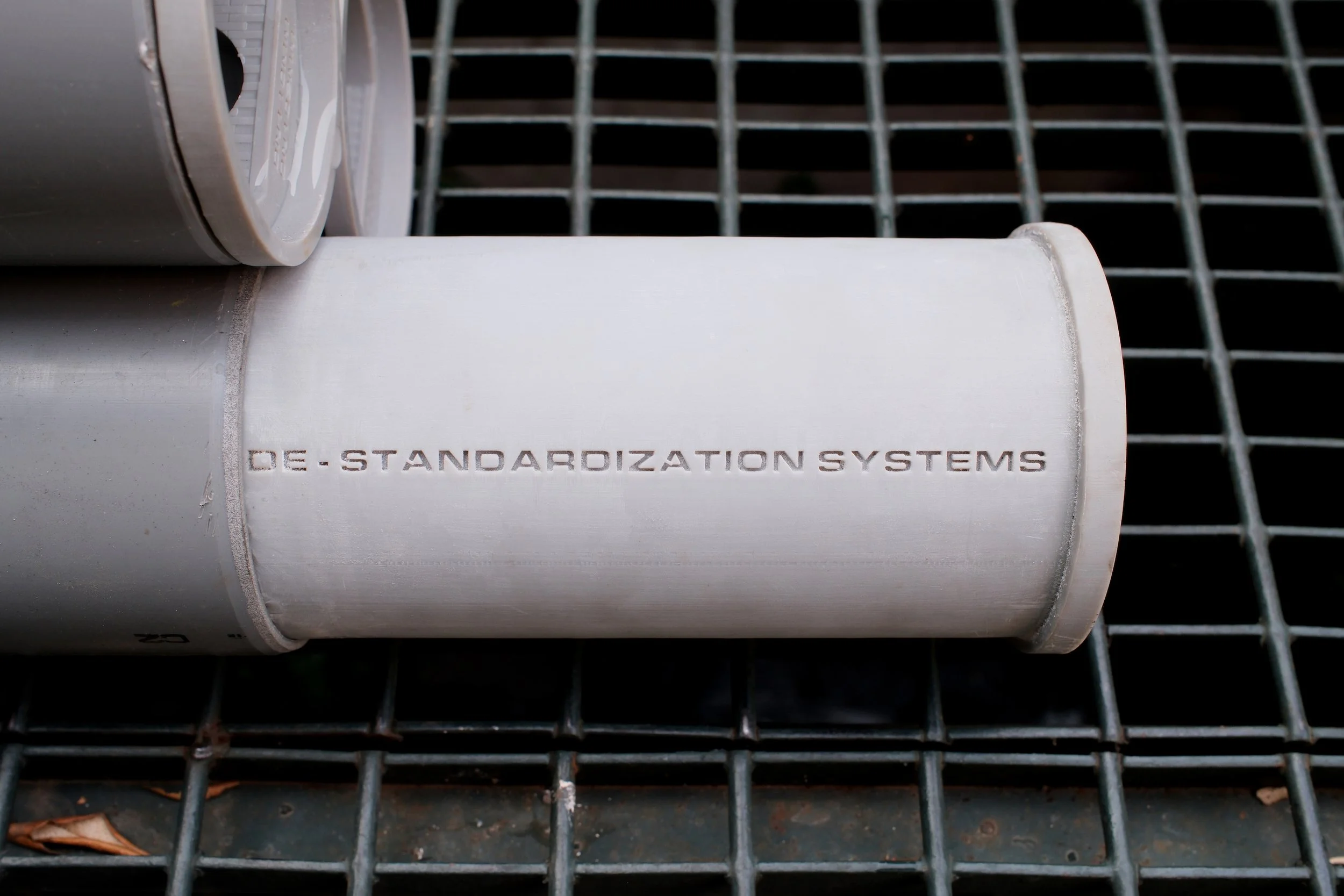 Rodrigo Red Sandoval Hydra PVC pipe engraved with de-standardization systems text, Croma Art Week