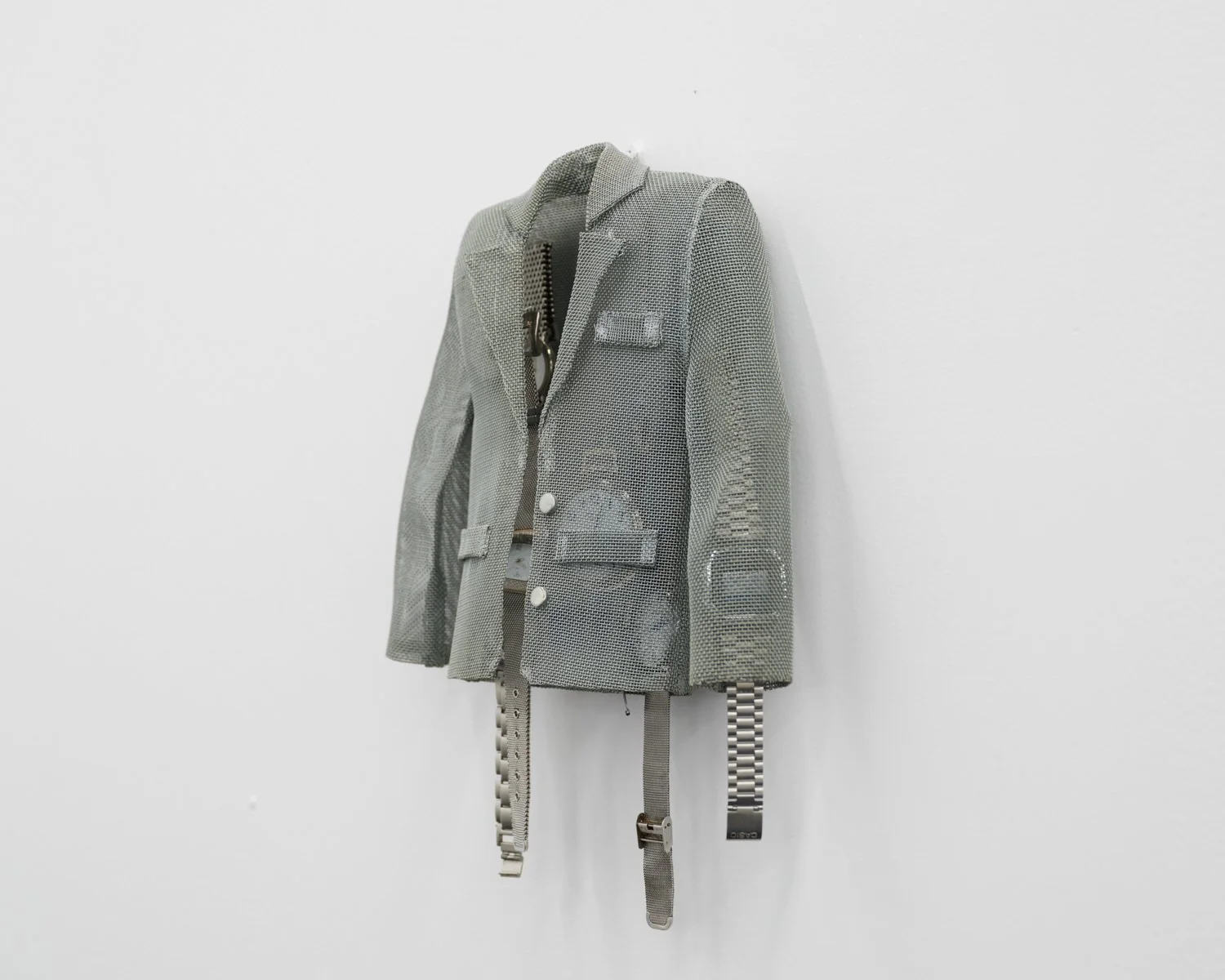 General view of “Shell,” a metal mesh sculpture embedded with wristwatches, exhibited at Material Art Fair.