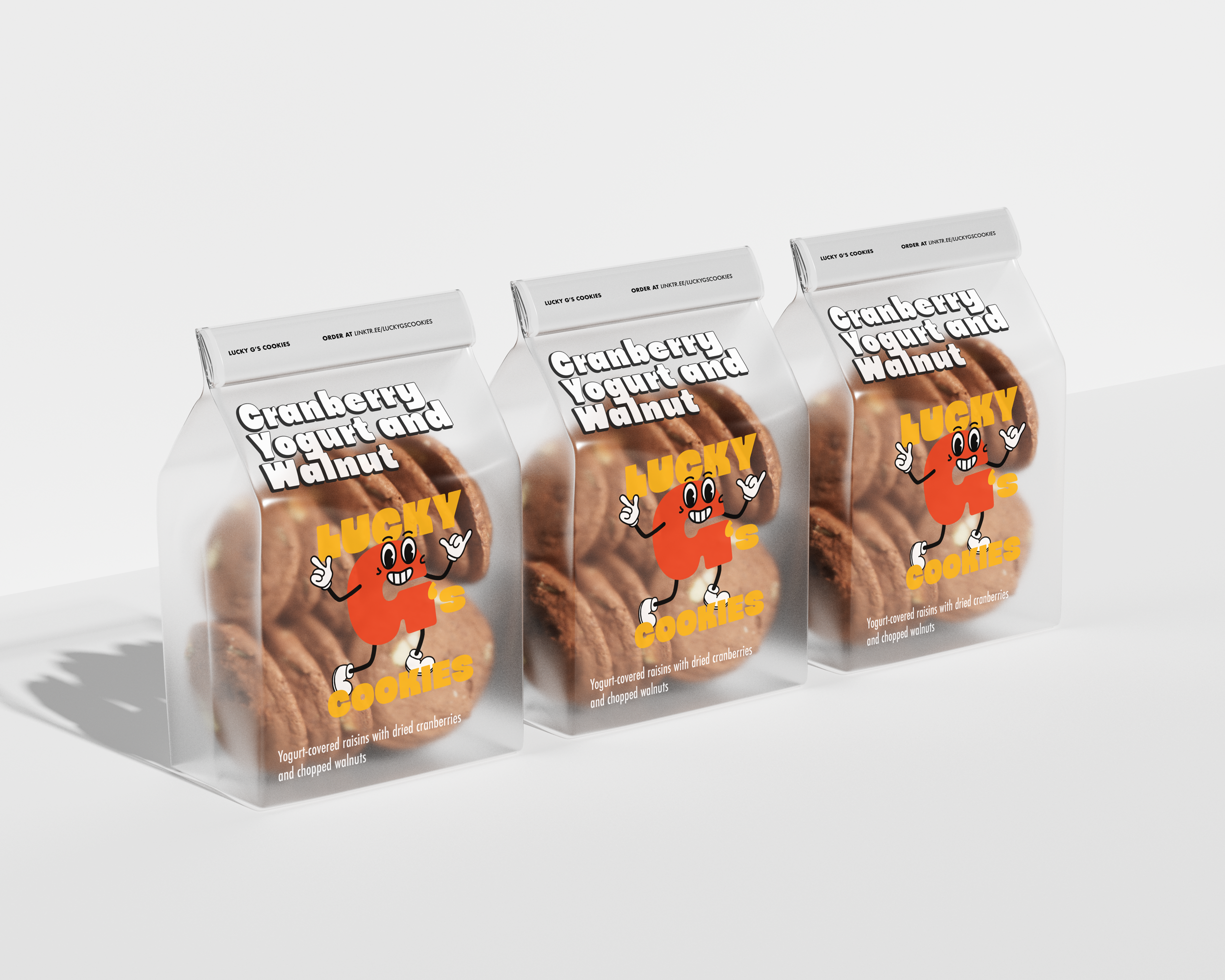 Three transparent snack packages labeled "Grapberry Yogurt and Walnut" with a cartoon character and description of yogurt-covered raisins with dried cranberries and chopped walnuts.