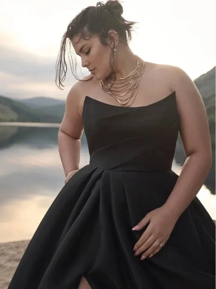 Black wedding gowns can be couture.  We love the cat eye neckline on Aspen by Sottero and Midgley.
