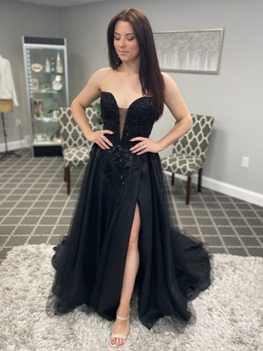black wedding dress in buffalo new york with a slit. 