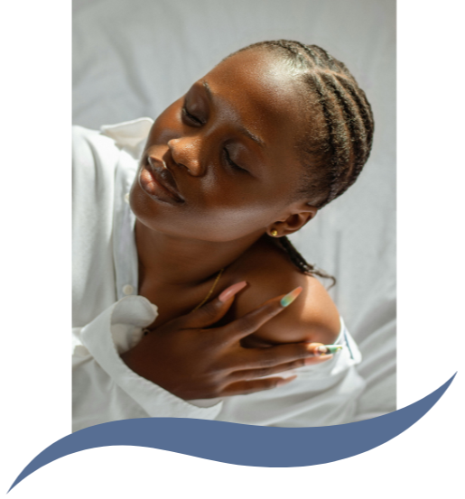 Woman resting her head back with eyes closed, hand resting gently on her own shoulder