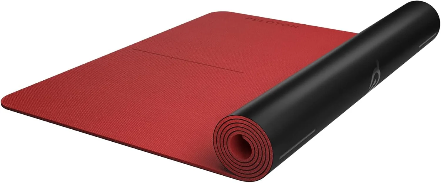 Black and red natural rubber Peloton branded workout mat