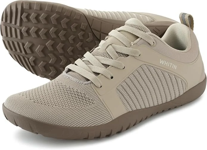 Pair of tan barefoot style women's hiking and walking shoes