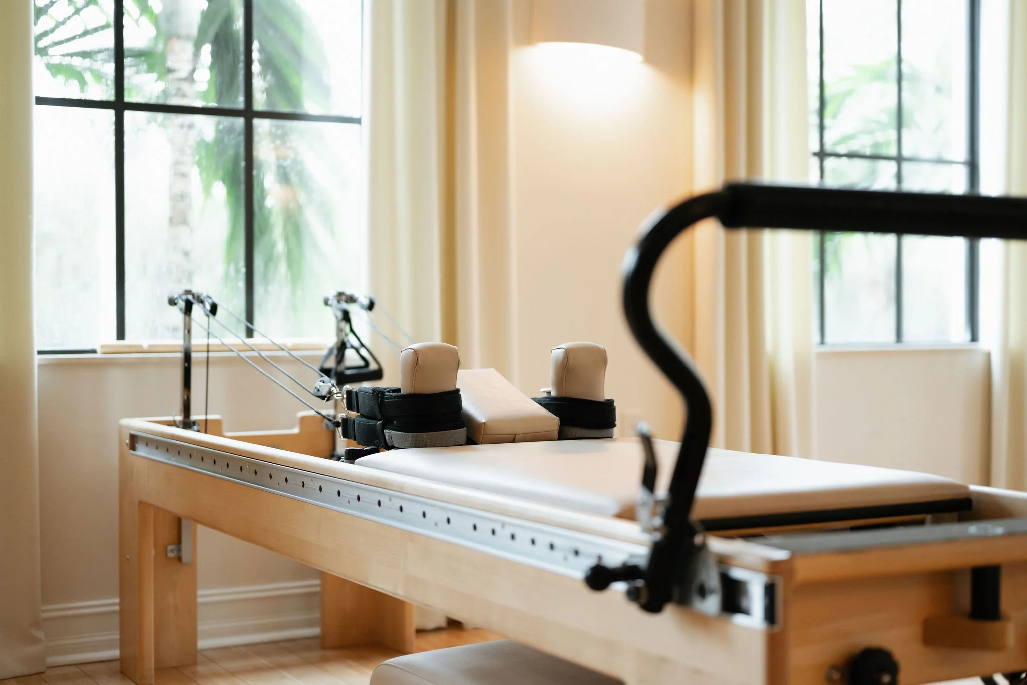 Pilates Reformer with Konnector straps at Core Elements Pilates Studio in Jupiter, FL
