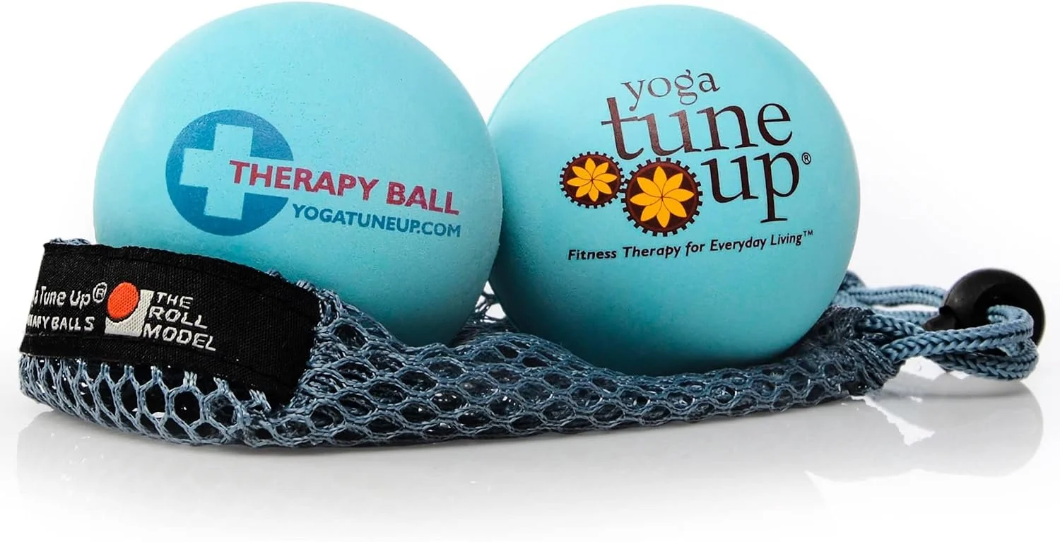 Pair of aqua colored Yoga Tune Up Therapy Balls